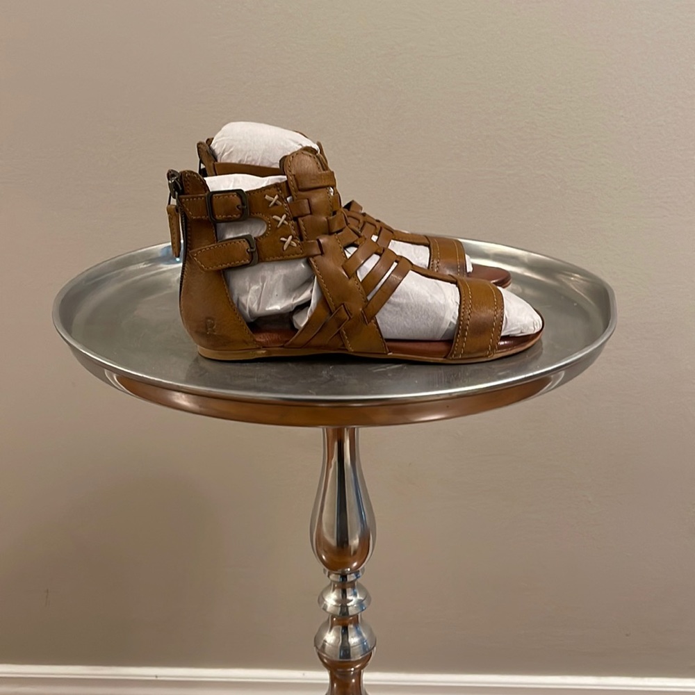 Brand new brown gladiator sandals! Size 6.5  Never worn!!!still packed in paper!